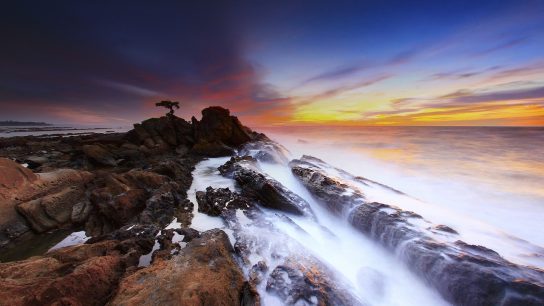 coast sunset waves rock formations 1292258